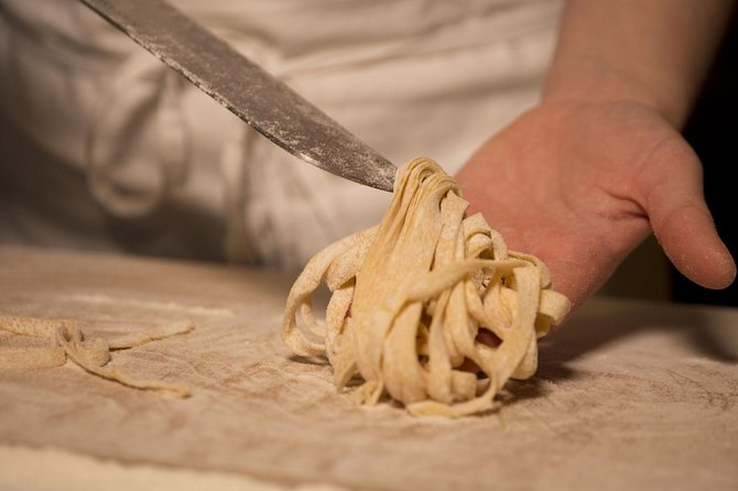 3 in 1 Cooking Class near Navona: Fettuccine, Ravioli & Tiramisu - Rolling fettuccine by hand