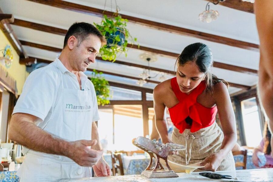 Amalfi: Mozzarella, Fettuccine, and Tiramisù Cooking Class - Turning curd into mozzarella