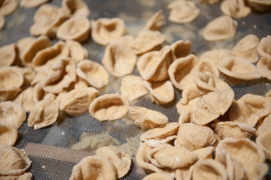 Bari Rickshaw Tour with Pasta Experience - Eating orecchiette with tomato sauce
