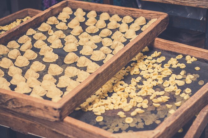 Bari Walking Tour with Pasta Experience - Piazza Mercantile and the social heart of Bari