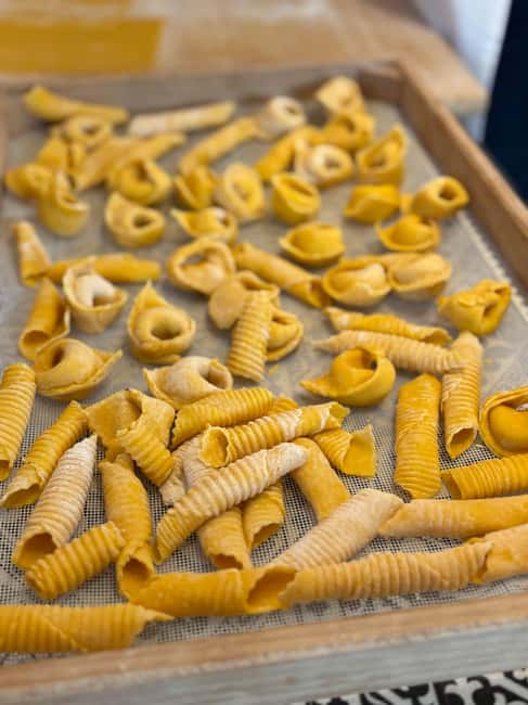 Bologna: 3 Pastas, Tiramisu and Unlimited Wine Tasting - Sitting down to eat what you made