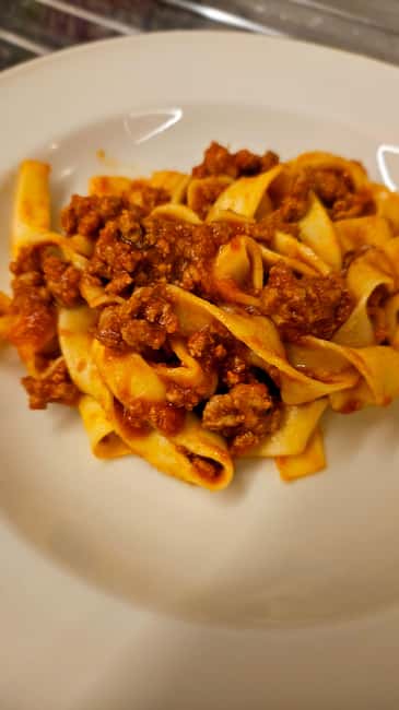 Bologna: Express Pasta-Making Class with Tasting - Meeting Alessia at the gray gate