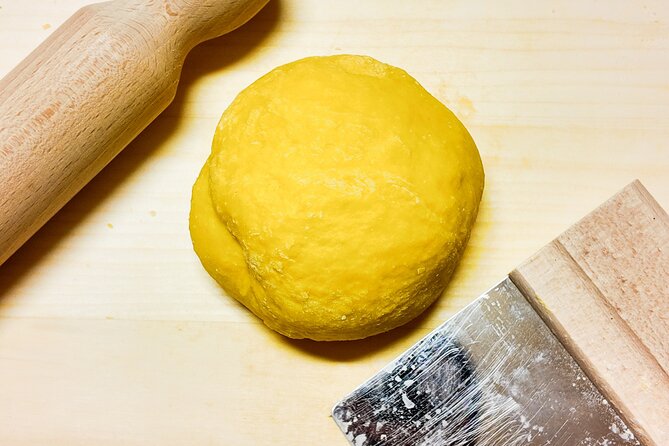 Bologna Local Pasta Cooking Class, Ragu, Spritz, Wine & Gelato - Rolling and cutting tagliatelle by hand
