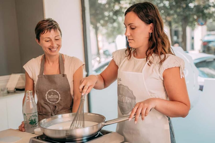 Bologna: Original Lasagna & Gelato Class at a Cooking School - Sitting down to eat your own lasagna