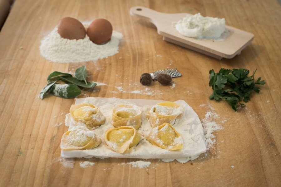 Bologna: Pasta & Tiramisu Cooking Class at a Local's Home - Shaping two pasta favorites