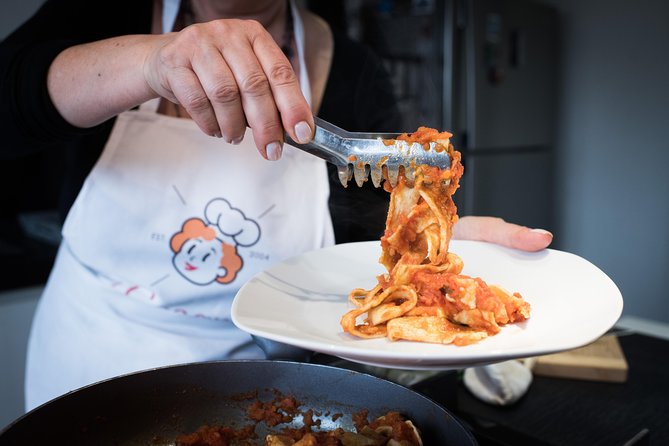 Cesarine: Fresh Pasta Class & Meal at Local's Home in Lucca - Wine, olive oil, and the social side