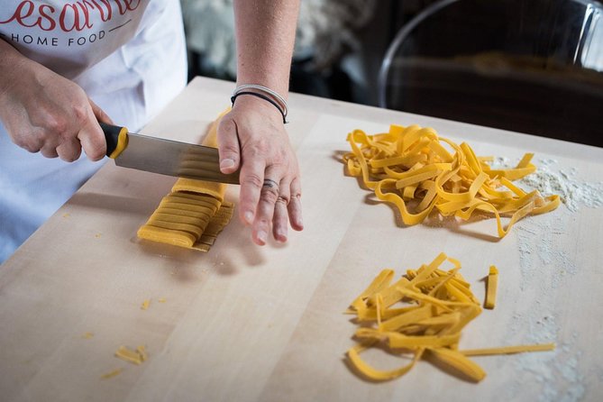 Cesarine: Pasta & Tiramisu Class at Local's Home in Verona - Cooking pasta in a Verona home