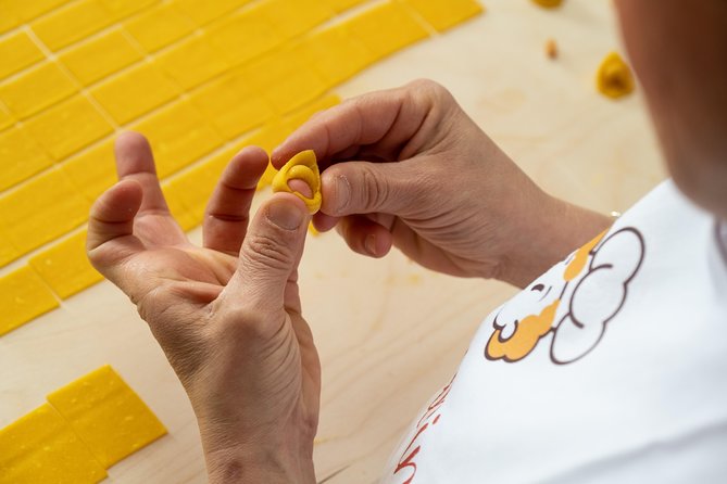 Cesarine: Small group Tortellini Class at Local's Home in Bologna - Cooking, sitting down, and eating your work