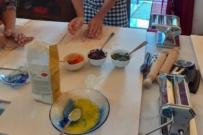 Colorful Pasta Workshop in Bologna with meal - Rolling and cutting pasta by hand