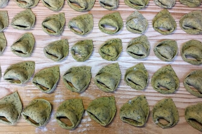 Colorful Pasta Workshop in Bologna with meal - Making tortellini, ravioli, and tortelloni