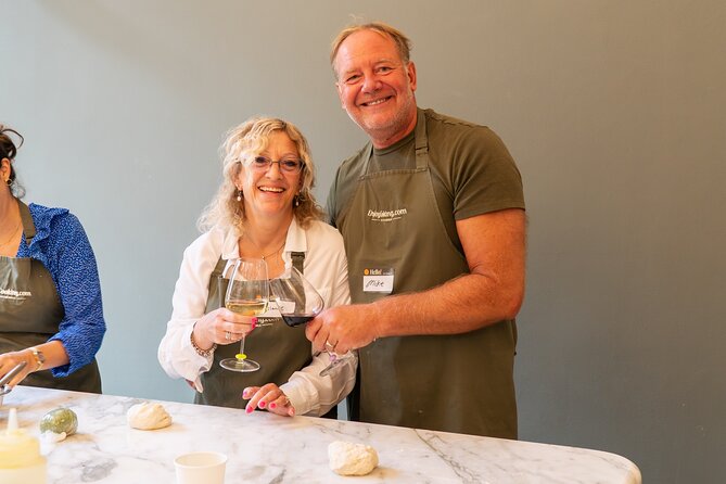 Cook & Dine in Rome: Pizza, Ravioli & Gelato with Unlimited Wine - Rolling pasta dough and shaping ravioli