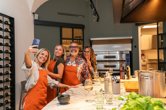 Exclusive Pasta & Tiramisu Class with Wine near by Colosseum - Wine, olives, and the social side