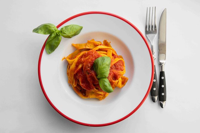 Fettuccine Ravioli and Tiramisu Cooking Class in Rome - Making pasta near Piazza Navona