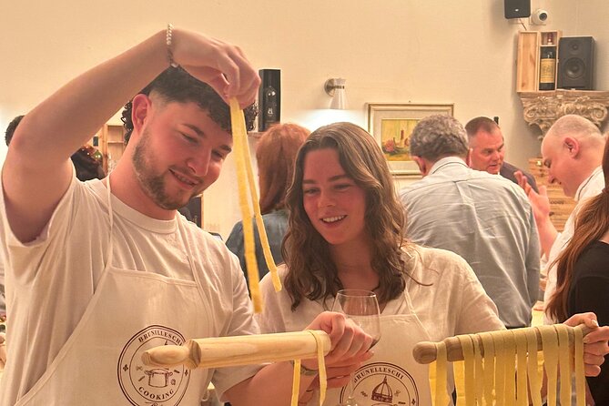 Florence: Flambé Cheese Wheel Truffle Pasta Class & Tiramisù - A personal chef leads the pasta work