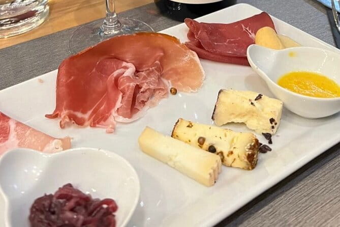 Florence Food Tour with Truffle Pasta, Steak & Free Flowing Wine - The wine window and crostini stop