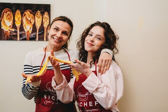 Florence: Pasta Cooking Class with Unlimited Wine - The chefs keep the room active