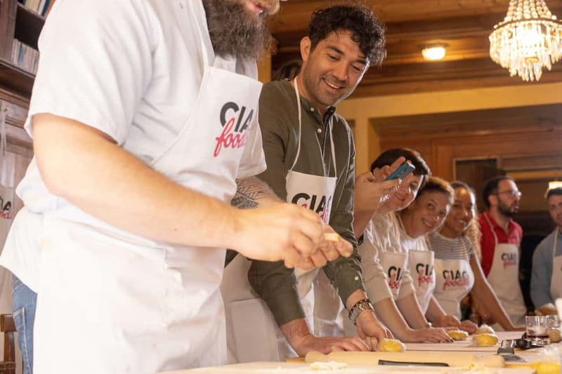 Florence: Pasta & Tiramisu Class with Unlimited Wine - Shaping tagliatelle and ricotta ravioli