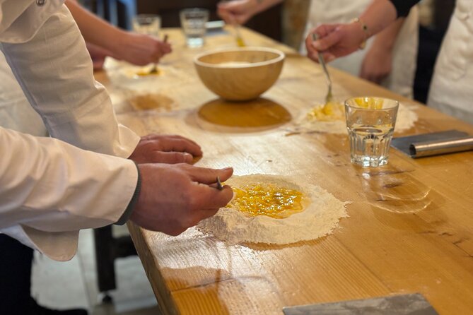 Florence: Pasta & Tiramisu Cooking Class with lots of Good Wine - Folding ricotta and spinach ravioli