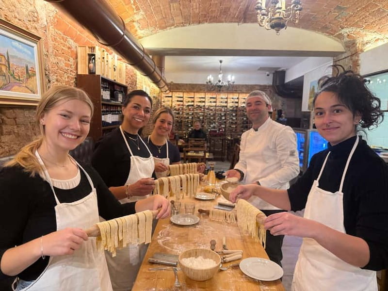 Florence: Premium Pasta Cooking Class with Tiramisu & Wine - Unlimited wine and a shared table