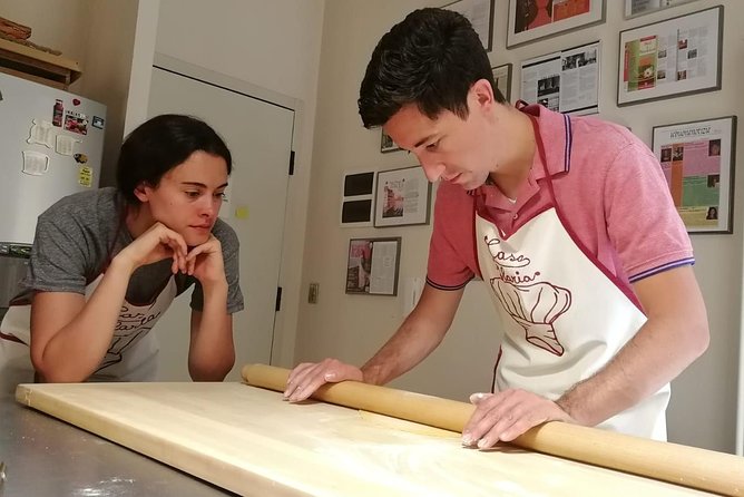 Make traditional handmade pasta from scratch with a local chef! - Sitting down to eat what you made