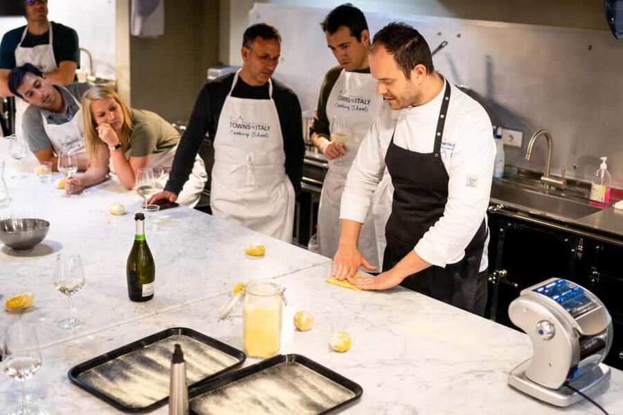 Milan: Pasta Class with Gelato or Tiramisù & Unlimited Wine - Wine, family suitability, and the social side