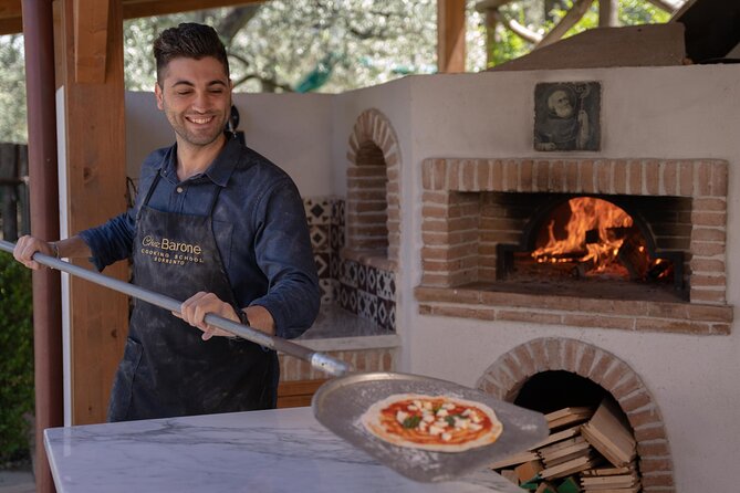 Pasta and Pizza Master Class with Pick Up in Sorrento - Arriving at the outdoor kitchen above the coast