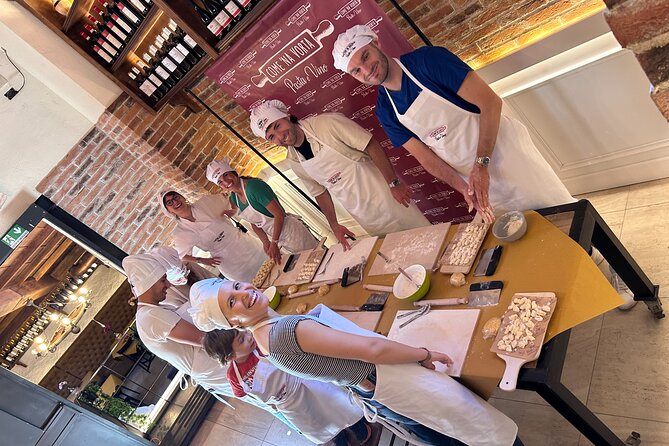 Pasta and Tiramisu Cooking Class at Come Na Vorta Navigli Milan - Building tiramisu one layer at a time