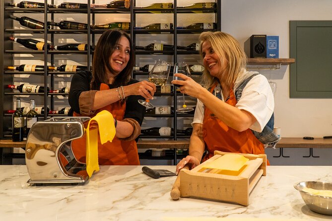 Pasta and Tiramisu Making Class with Fine Italian Wine in Rome - Building tiramisu layer by layer