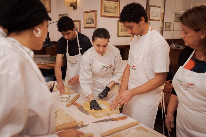 Pasta Cooking Class in Rome - Fettuccine Class in Piazza Navona - Making fettuccine at Tucci in Piazza Navona