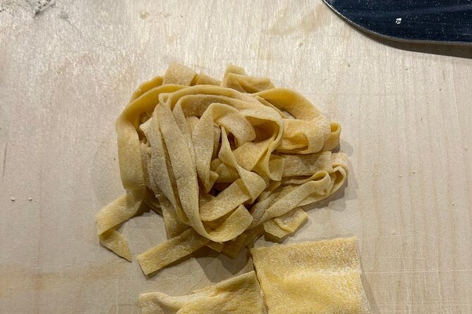 Pasta Fettuccine, Ravioli and Tiramisu Cooking Class in Florence - Eating what you made with drinks