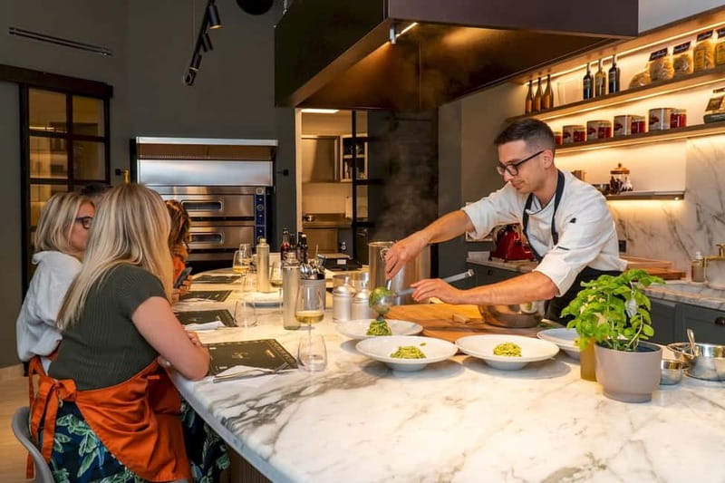 Rome: Hands-On Pasta & Tiramisu Class with Unlimited Wine - Entering the Roman kitchen