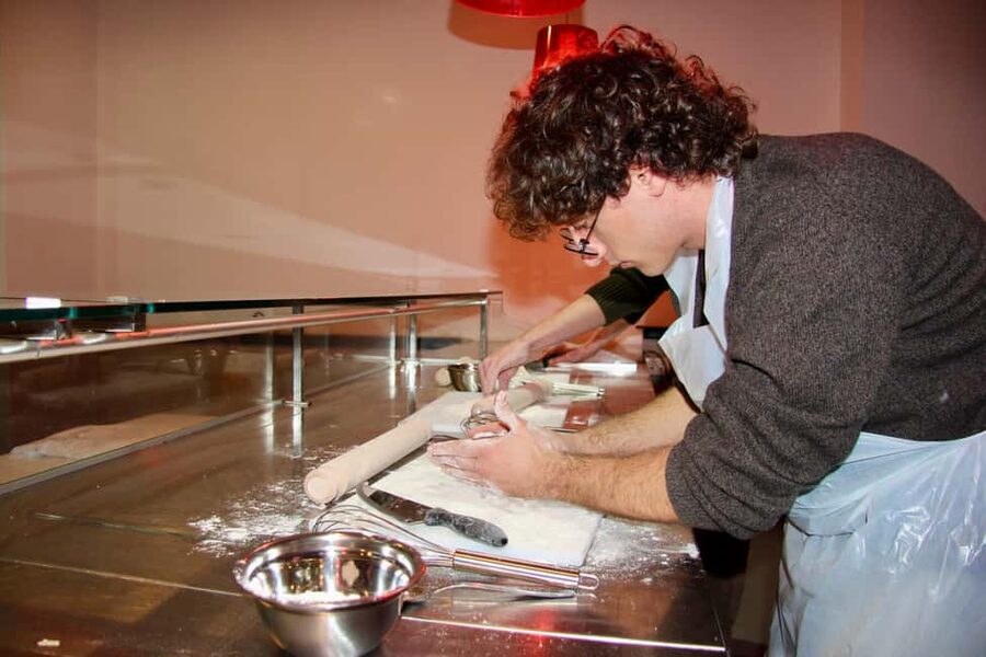 Rome: Lasagna, Fettuccine Pasta & Tiramisu Cooking Class - Mixing tiramisu for the final course