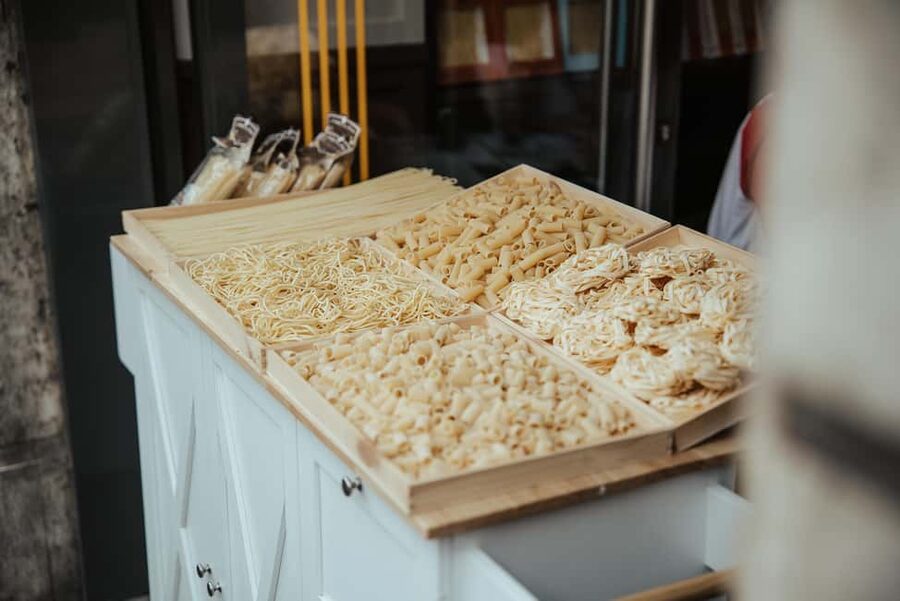 Rome: Pasta and Tiramisu Cooking Class with Spritz and Wine - Mixing flour and eggs by hand