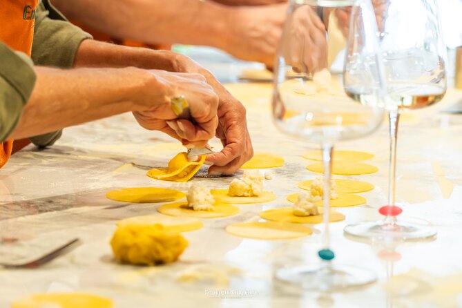 Rome Pasta and Tiramisu Making Experience with Premium Wine - Layering tiramisu from scratch