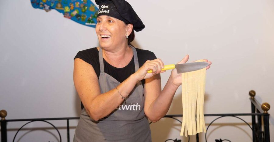 Rome: Pasta and Tiramisu Shared Cooking Class with Wine - Rolling out fettuccine and shaping ravioli