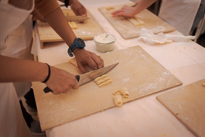 Rome: Pasta Fettuccine Ravioli and Tiramisu Cooking Class - Shaping ravioli and learning the fussy part