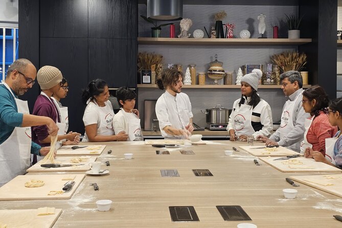 Rome: Pasta Fettuccine Ravioli and Tiramisu Cooking Class - Arriving at Via Firenze and settling into the kitchen