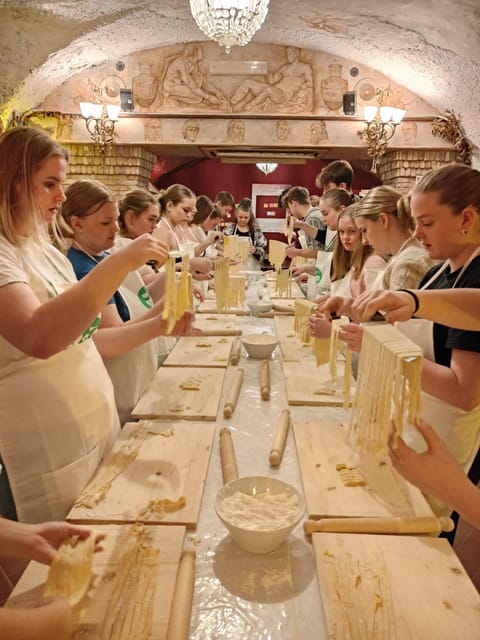 Rome: Pasta & Tiramisu Cooking Class near the Spanish Steps - The old walls set the mood