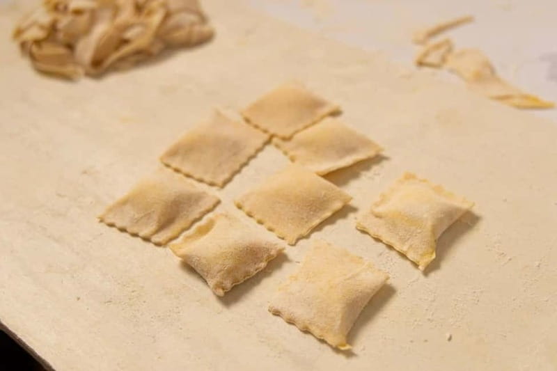 Rome: Ravioli, Fettuccine and Tiramisu Cooking Class - Sitting down to eat your work