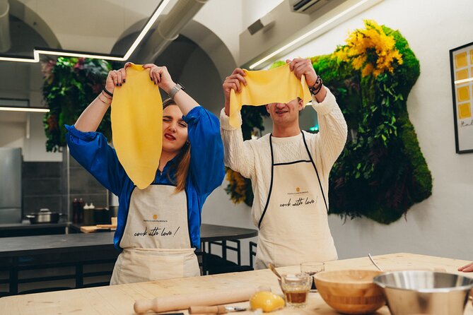 Small-Group Pasta Cooking Class and Market Tour in Florence - Crossing into the kitchen for handmade pasta