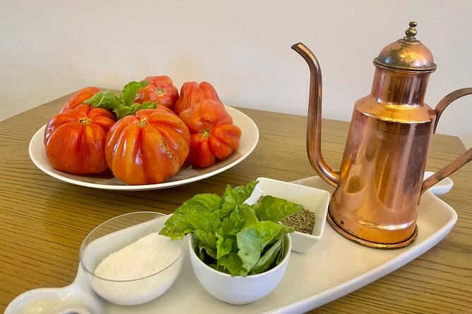 Sorrento: Hands-On Pasta, Tiramisu & Limoncello Fun Class - A garden welcome before the cooking starts