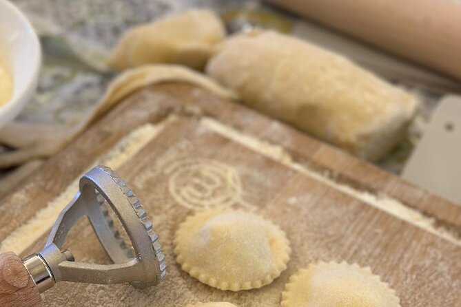 Sorrento: Hands-On Pasta, Tiramisu & Limoncello Fun Class - Learning how limoncello is made