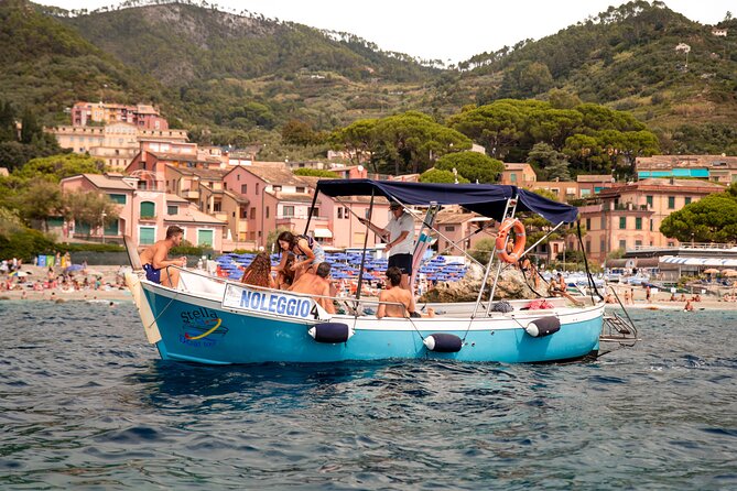 Sunset on a boat with fresh pesto pasta - Why seeing Cinque Terre from the water matters