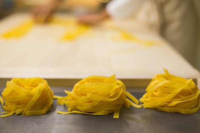 Three Hour Pasta Course with Final Tasting - Cutting tagliatelle with a knife