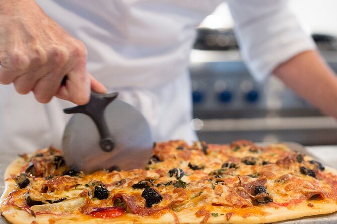 Tortelloni and Tagliatelle Cooking Class in Bologna + Wine - Price, booking timing, and the one serious warning