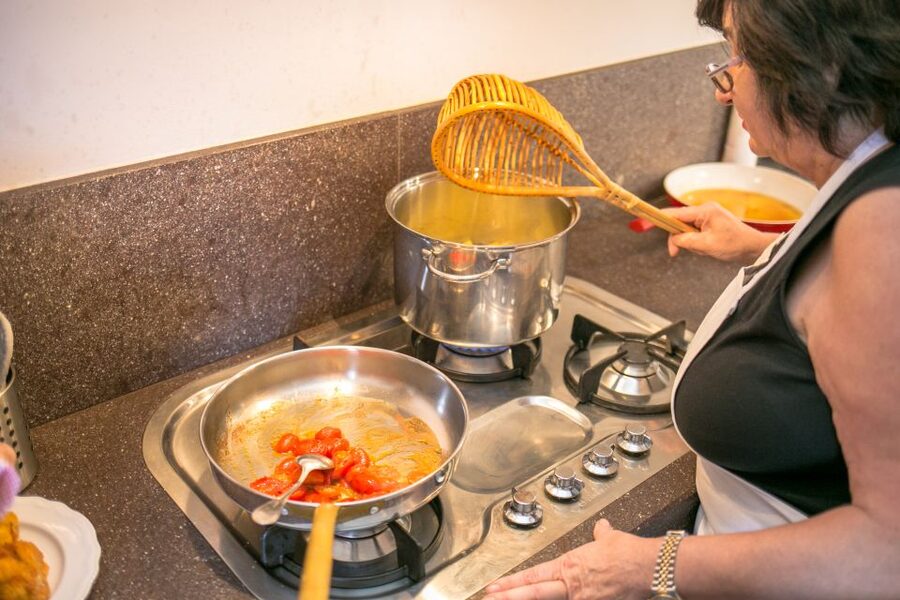 Treviso: Pasta & Tiramisu Cooking Class at a Local's Home - Cooking pasta in a Treviso home
