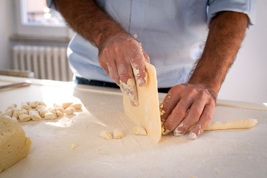 Turin: Private Pasta-Making Class at a Local's Home - Sitting down to eat what you made