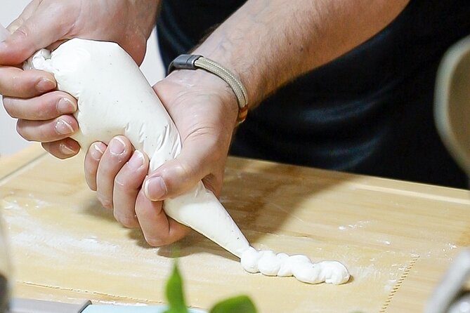 Valencia: Fresh Pasta Workshop with Food at Coolinary Experience - Using the pasta machine and shaping pasta roses