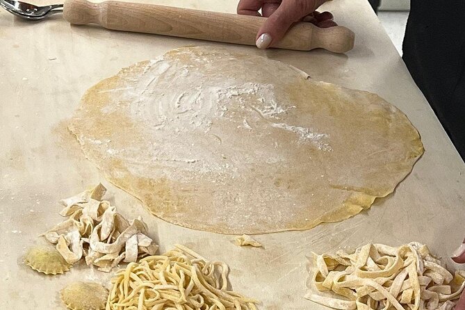 Venice Cooking Class in Mestre Pasta and Tiramisu Wine - Sitting down to eat what you made