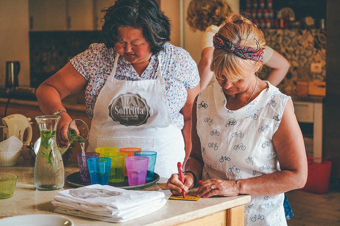 Verona: Italian Cooking Class with Pasta, Risotto and Tiramisù - Stirring risotto, including Verona’s Amarone style